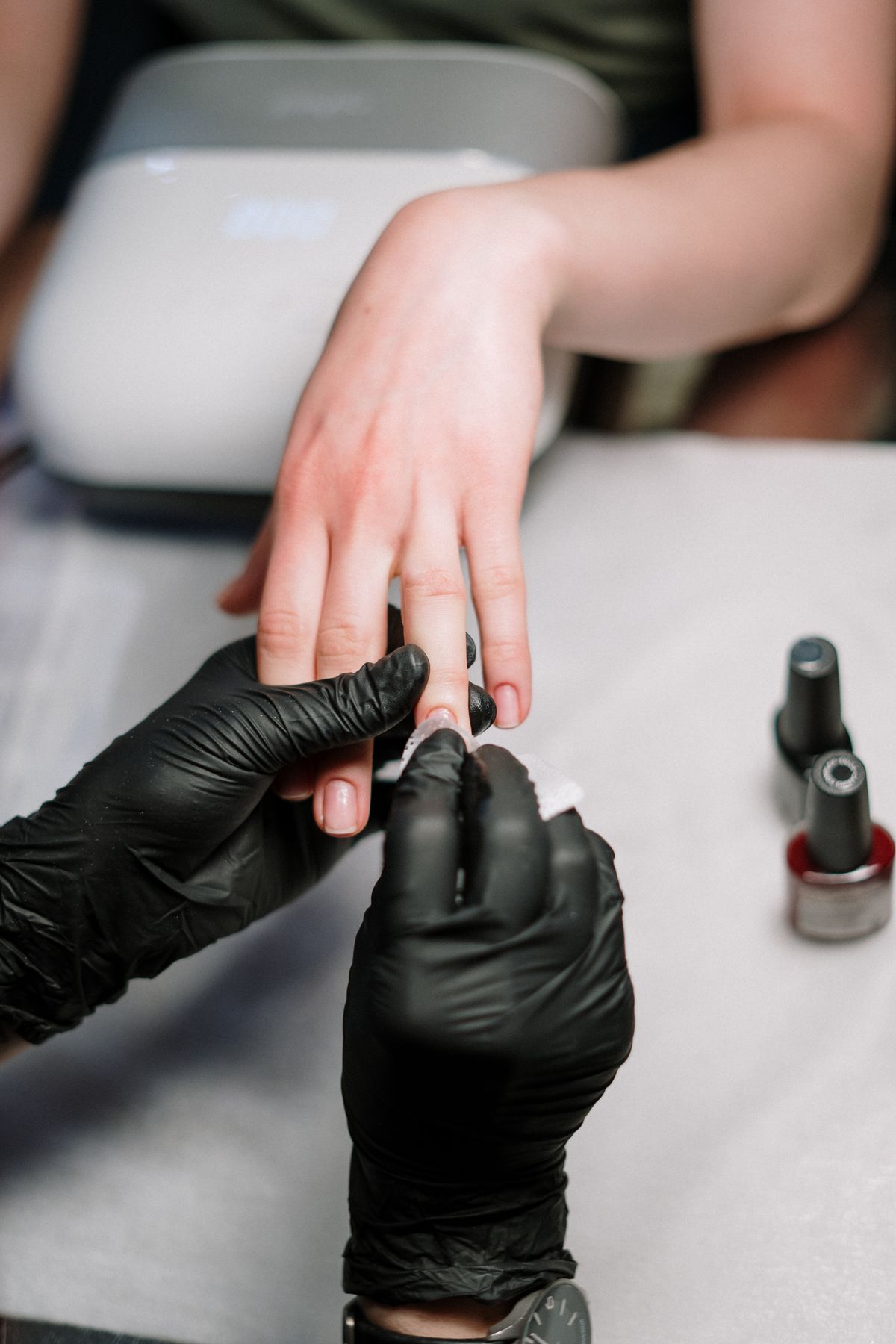 Manicure service in progress at Blush Nail & Beauty Bar